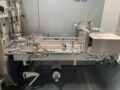Skinetta ASK 450 BU Straffbanderolier-/Volleinschlagmaschine mit Schrumpftunnel